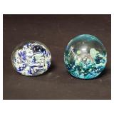 Pair of art glass paperweights.