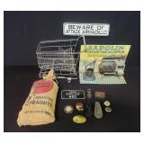 Box of miscellaneous sign, doll shopping cart,