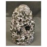 Polished mystical merlinite specimen