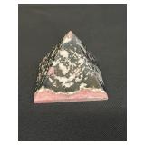 Polished pyramid rhodonite specimen