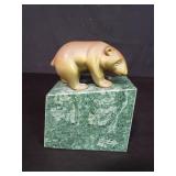 Brass bear figure on a marble base