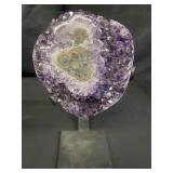 Amethyst quartz specimen on metal stand