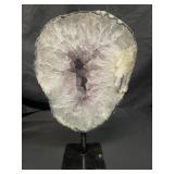 Amethyst quartz specimen on metal base