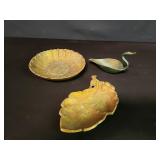 Two cast iron trinket dishes and one brass swan