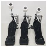 Group of three kick pedals