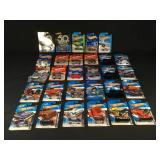 29 Hot Wheels new in packaging