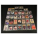 35 hockey trading cards in hard cases