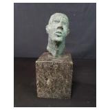 Vintage bronze head sculpture on marble base