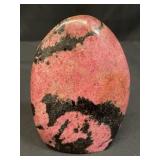 Polished rhodonite specimen