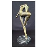 Signed and numbered nude bronze sculpture on a