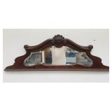 Antique mahogany beveled wall mirror