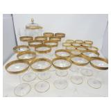 Group of etched glass and gold rim stemware with