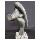 Signed and numbered brass abstract sculpture on a