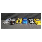 Six diecast model cars 1:24 scale