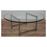 Modern chrome coffee table with glass top