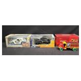 Three die-cast model cars 1:24 scale
