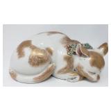 Asian porcelain sleeping cat figurine