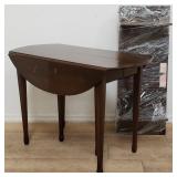 Ethan Allen walnut drop leaf dining table with 2