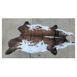Faux cow hide rug