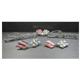 Vintage Corvette and Stingray emblems