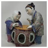 Chinese porcelain girl and boy fighting crickets