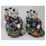 Pair of Japanese porcelain Karako figurines