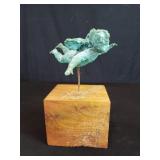 Vintage bronze cherub figure on a walnut base