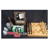 Box of miscellaneous poker chips, chess set,