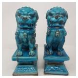 Pair of Chinese pottery foo dog figurines
