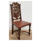 Theodore Alexander carved oak side chair with