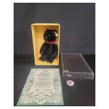 Limited edition Steiff black bear cub with