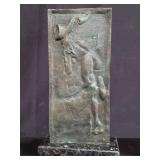 Signed Salvador Dali bronze plaque on a marble