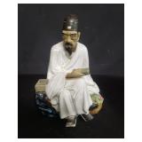 Chinese mudman figurine