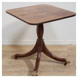 Baker Furniture mahogany table on casters