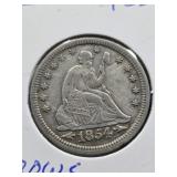1854 Seated Liberty silver quarter coin.