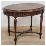 Vintage carved walnut oval side table