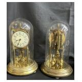 Pair of Kundo anniversary clock in glass