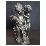 Brass boy and girl sculpture