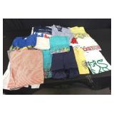 Box of clothes t-shirts, etc