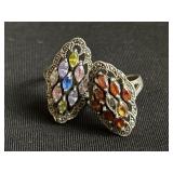 Pair of sterling silver rings with glass color