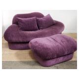 Vintage upholstered sofa with ottoman