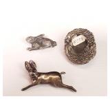 Three sterling silver brooches
