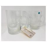 Four Tiffany & Co. crystal mugs