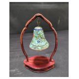 Vintage Chinese enameled bell on a mahogany stand