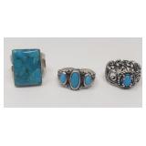 Three sterling silver rings with turquoise