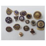 Fifteen 10k gold vintage pins, some with diamonds