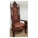 Mahogany and faux leather highly carved throne