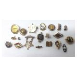 Twenty 10k gold vintage pins, some with gems