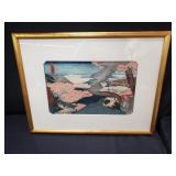 Vintage Japanese woodblock print framed under