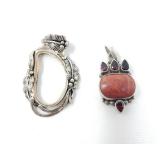 2 sterling silver pendants, one with garnets and